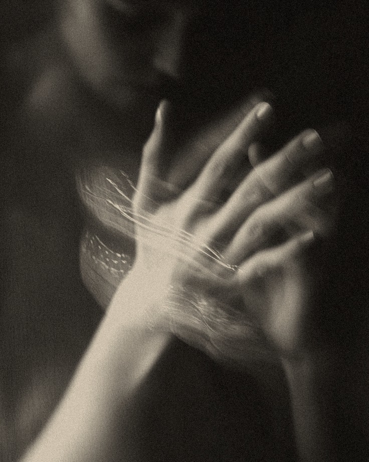Hands in motion during a flowing, energy-restoring massage